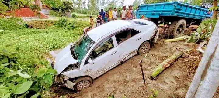 Private Car Plunges into Ditch in Palashbari, Two Injured